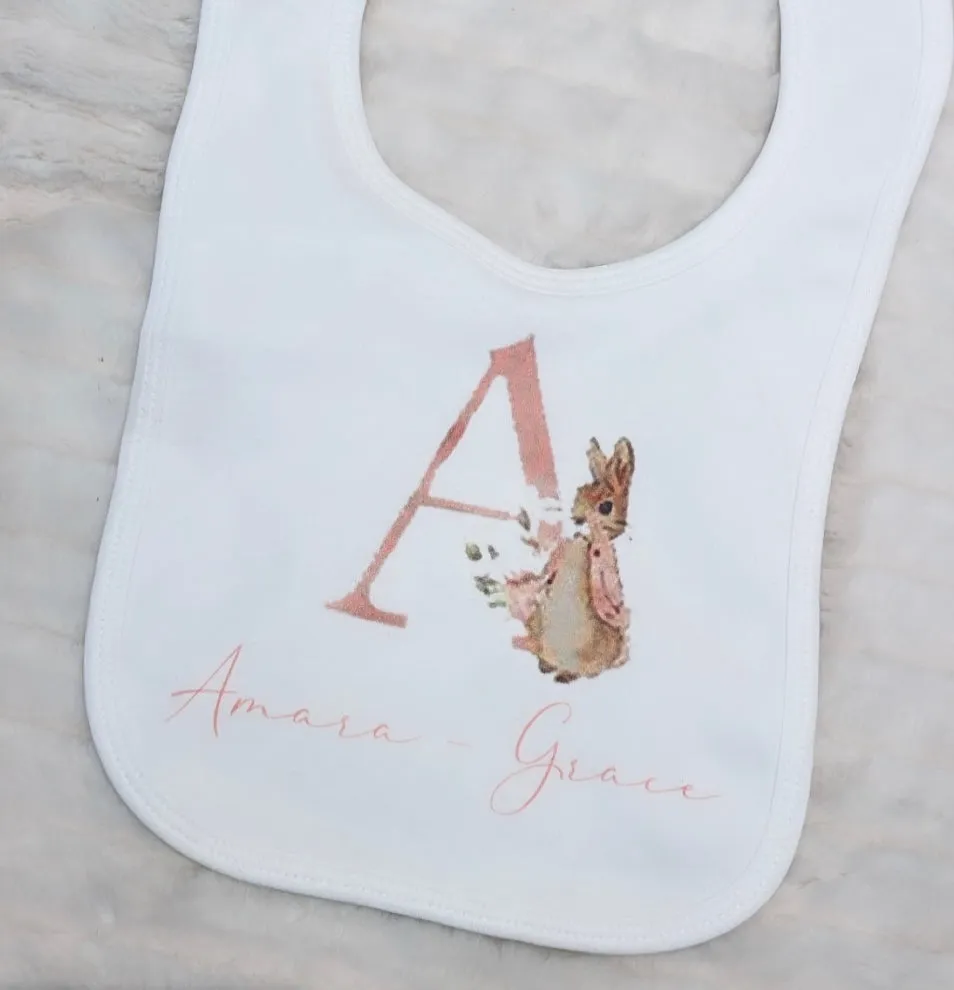 Peter rabbit pink lettering