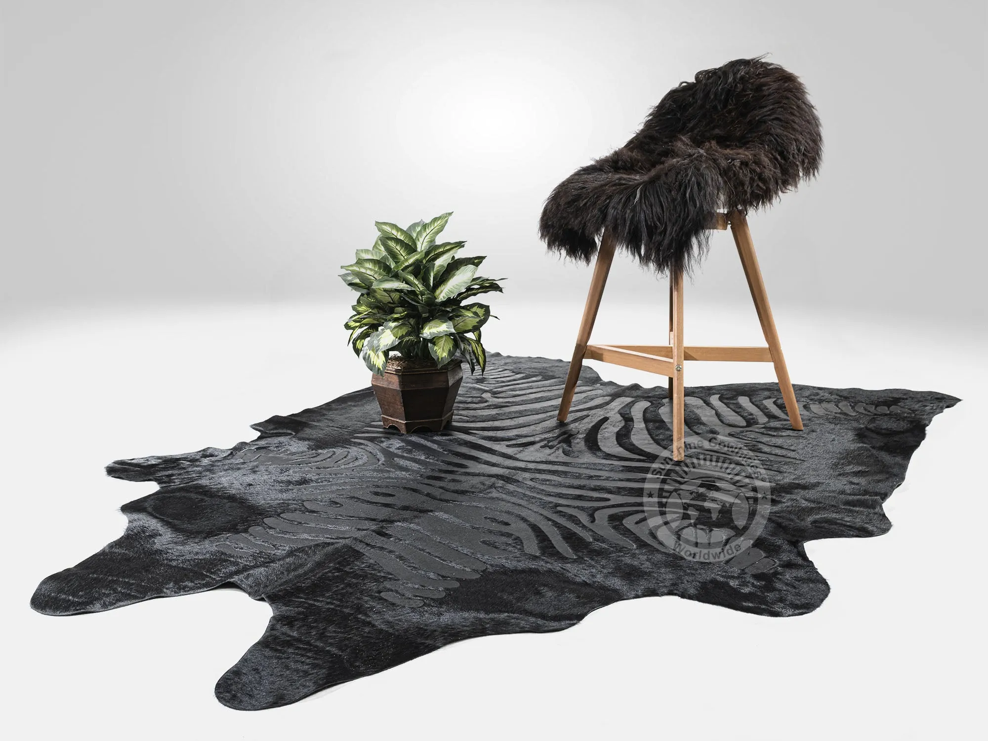 Zebra Acid Wash on Dyed Black Cowhide Rug