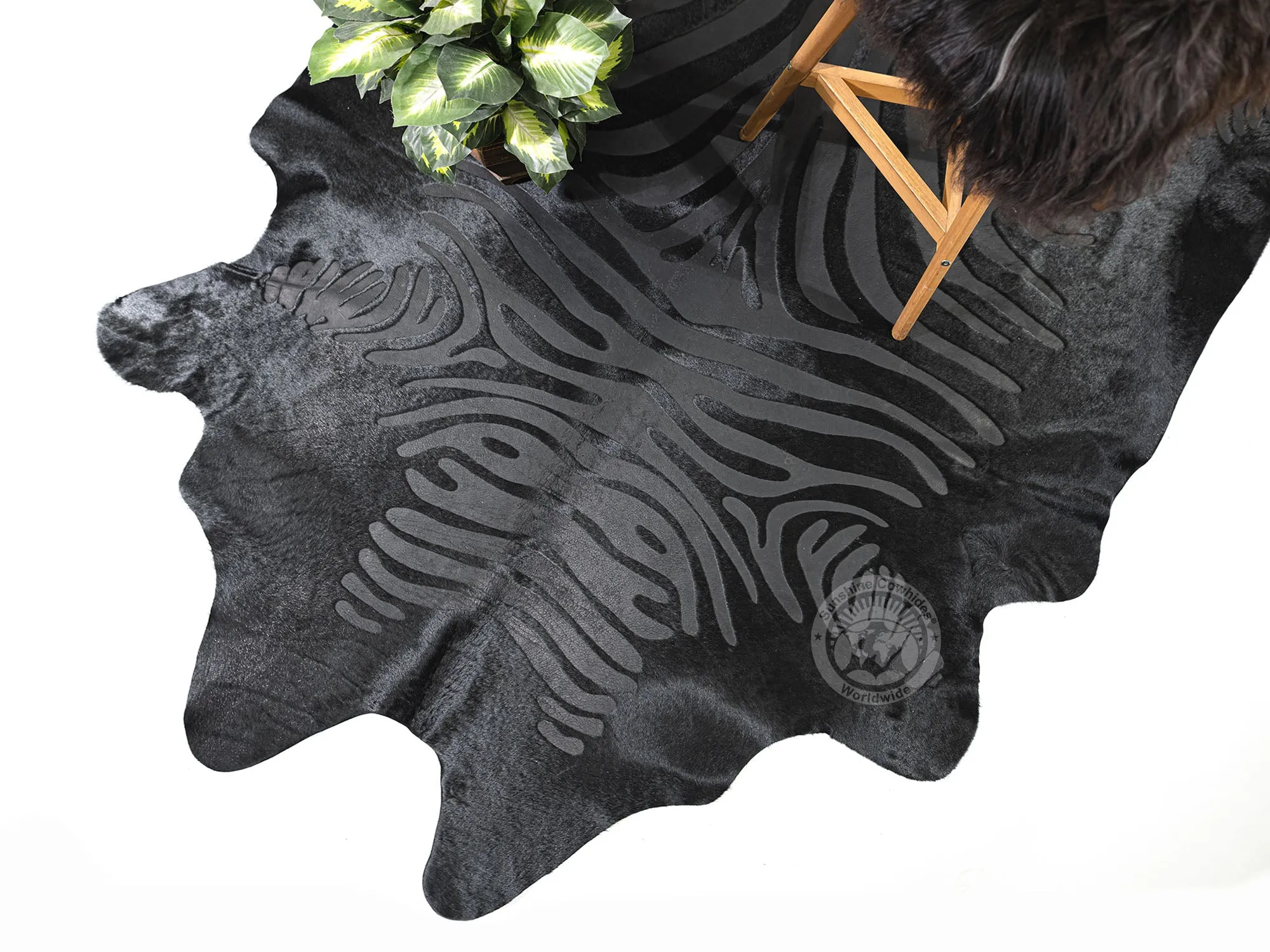 Zebra Acid Wash on Dyed Black Cowhide Rug